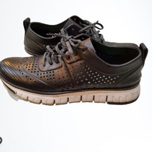 Cola hann Zerogroud wingtip leather shoes .